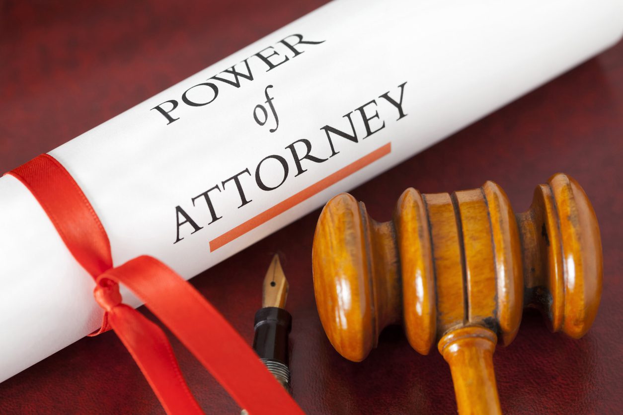 Florida estate planning attorney explaining the law of power of attorney to a Central Florida family at Lumsden Law Firm in Orlando.